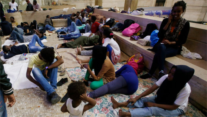 Dozens of asylum seekers barricade themselves in camp canteen 