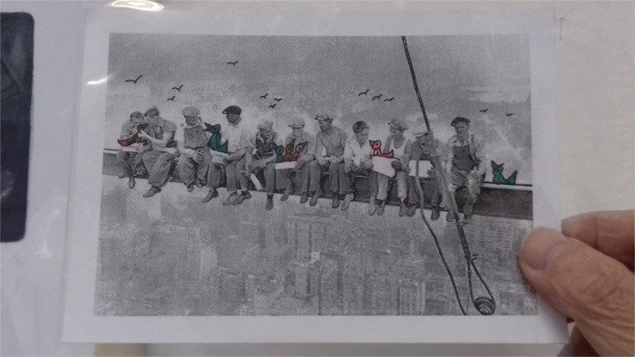 Popovič lunching atop a skyscraper