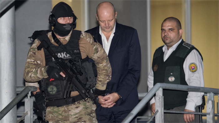 Ex-minister allegedly hires a contract killer