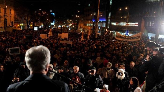 Protestors outside parliament demand an end to corruption