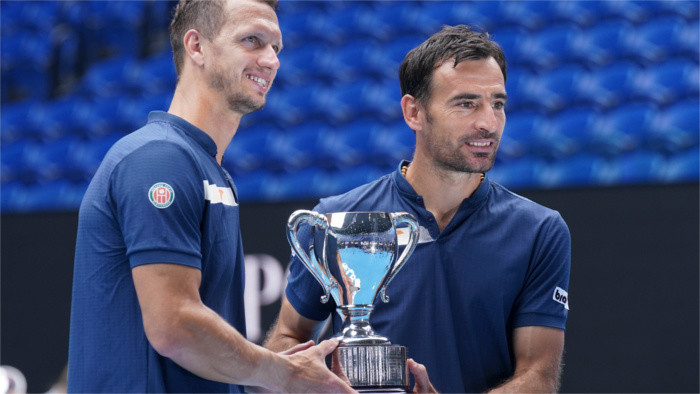AO: Prvý grandslamový titul pre Filipa Polášeka