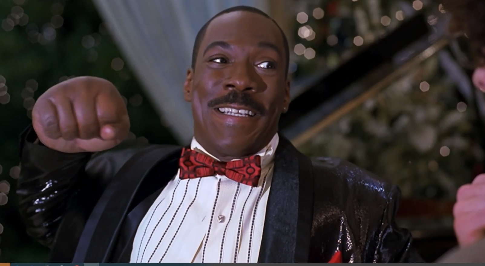 päsť-Eddie-Murphy-STVR